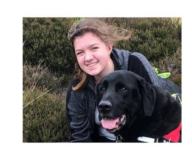 Megan Pollitt, known as Meg, with her family dog Yoda. (Photo by South West Police).