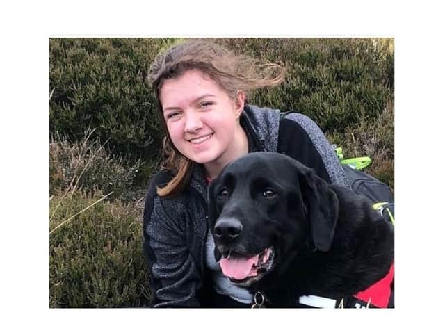 Megan Pollitt, known as Meg, with her family dog Yoda. (Photo by South West Police).
