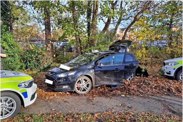 The car was brought to a halt after it collided with a police vehicle. Photo by Warwickshire Police