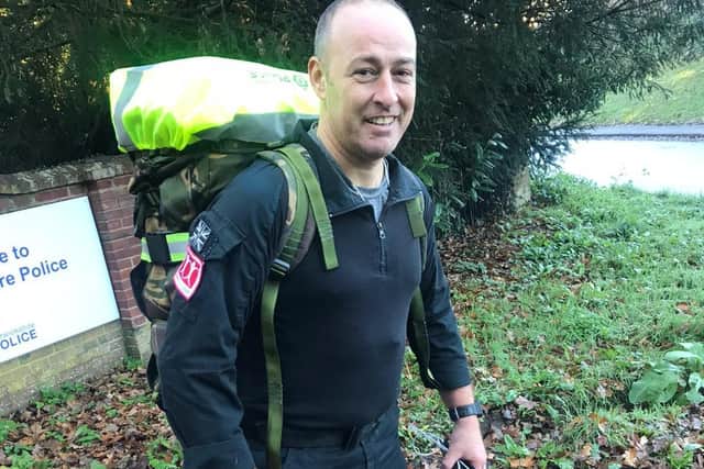 PC Scott Caswell, of Warwickshire Police, has completed an 86-mile walk of laps around the force's Leek Wootton HQ in 24 hours to raise money for the charity Veterans Contact Point.