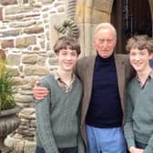 Evan and Brandon Whitt with veteran actor Charles Dance.