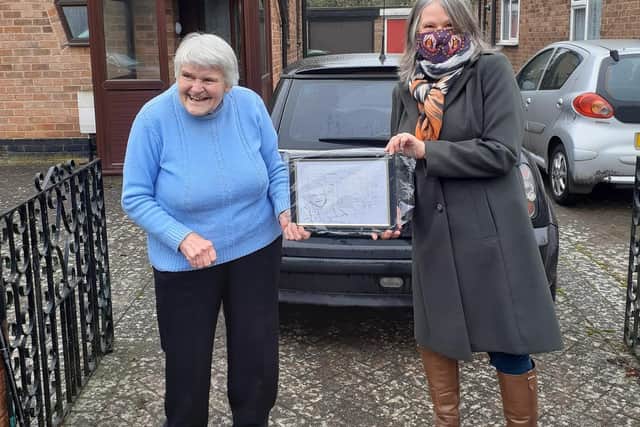 Margaret Kite received a sketch created by the talented artist Diane Shores; showing Margaret doing what she does best...collecting so many funds for a whole range of charities.