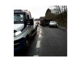 Emergency services are warning drivers to be careful after a car hit standing water and lost control, colliding with the another vehicle.