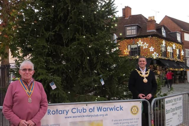 Warwick Rotary President with Warwick Mayor, Cllr Terry Morris putting the first card on the Christmas tree in November in the Market Place. Photo supplied