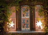 Neighbours in Arlington Avenue are revealing decorated windows, like the windows of an advent calendar, to bring a smile to faces at the end of a difficult year.