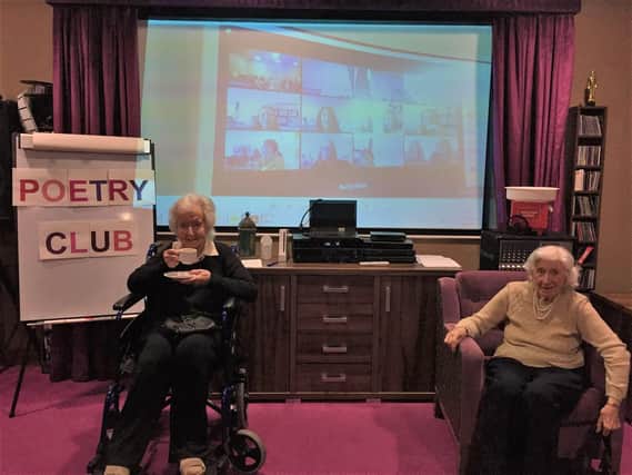 Priors House residents Win and Betty take part in the poetry club on Zoom.
