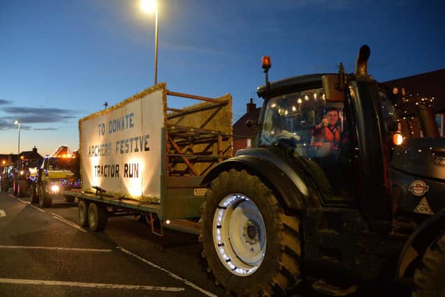 The Archers Festive tractor run makes it's way along Bill Crane Way in Lutterworth.
PICTURE: ANDREW CARPENTER