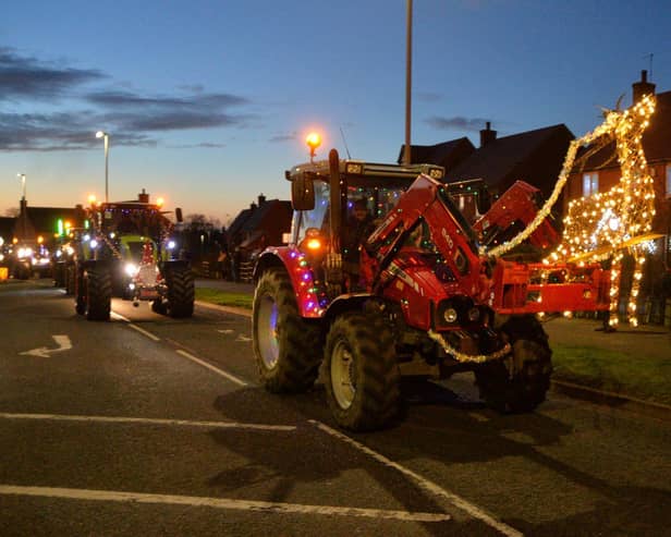 The Archers Festive tractor run makes it's way along Bill Crane Way in Lutterworth.
PICTURE: ANDREW CARPENTER