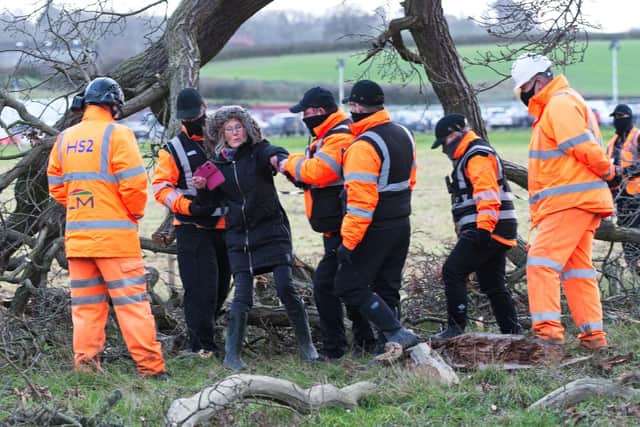 Victoria Lindsell was dragged off the site after she protested against HS2 removing branches from the tree. (Photo by Dave Hastings, dhphoto).