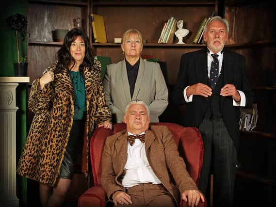 Photo attached: (Left to right) – Priory Theatre members Nicky Main, Ruth Jones, Brian Goredema-Braid and Ray Arber (seated), from the set of Tiptoe Through The Tombstones.