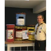 Nick Schofield, Group Scout Leader of 4th Kenilworth, with some of the collection boxes. Photo supplied