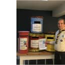 Nick Schofield, Group Scout Leader of 4th Kenilworth, with some of the collection boxes. Photo supplied