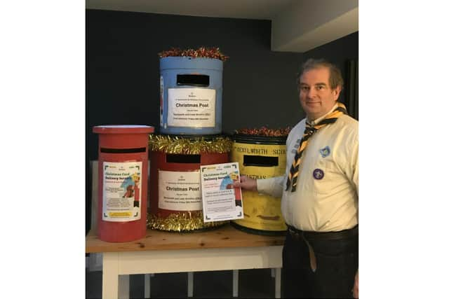 Nick Schofield, Group Scout Leader of 4th Kenilworth, with some of the collection boxes. Photo supplied