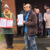 Bus campaigners in Long Lawford outside the former bus stop by Hurst Close in Round Avenue, Long Lawford, with copies of the 516-name petition in March 2019. Photo taken by Julie McLaren.