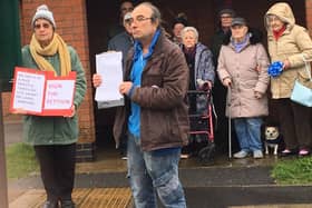 Bus campaigners in Long Lawford outside the former bus stop by Hurst Close in Round Avenue, Long Lawford, with copies of the 516-name petition in March 2019. Photo taken by Julie McLaren.