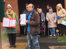 Bus campaigners in Long Lawford outside the former bus stop by Hurst Close in Round Avenue, Long Lawford, with copies of the 516-name petition in March 2019. Photo taken by Julie McLaren.