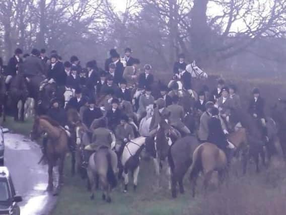 A photo, taken by hunt saboteurs, of the Warwickshire Hunt meeting en masse in a Tier 3 area in December