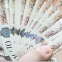 A postwoman from Rugby has just received the best delivery of all - a life-changing £140,000.