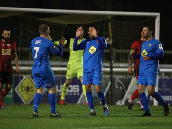 Leamington celebrate their third goal during their 3-0 success over Kettering Town in the fourth round of the FA Trophy. Pictures by Peter Short