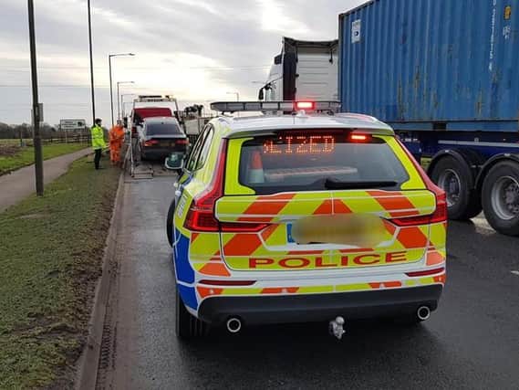 The Audi being seized. Photo: OPU Warwickshire, Facebook.
