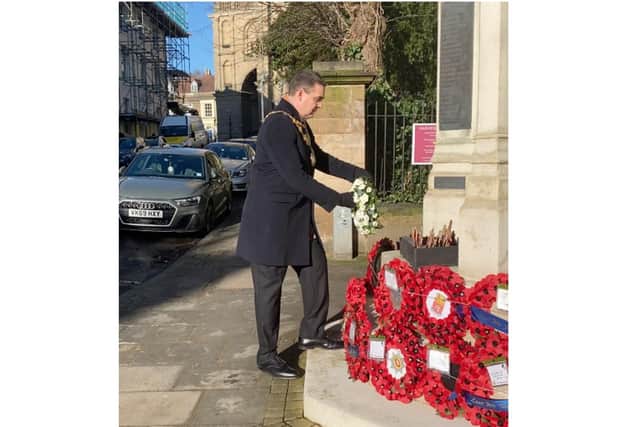 The Mayor of Warwick, Cllr Terry Morris, marked Holocaust Memorial Day for Warwick by reading a poem and laying a wreath. Photo submitted