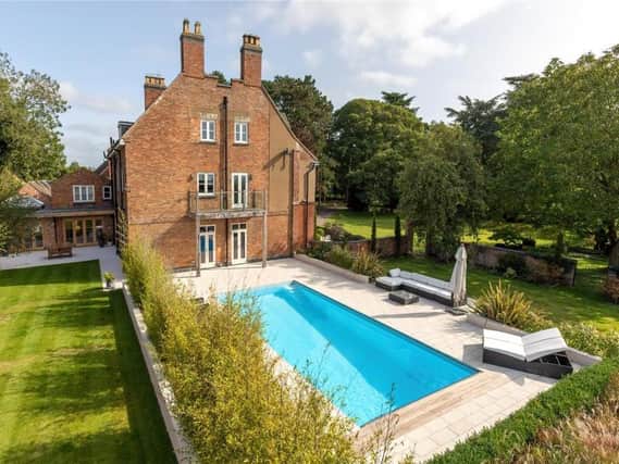 The inhabitants of this Dunchurch home don't have far to walk when they fancy a dip.