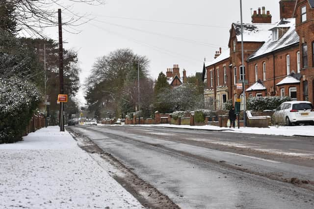 Still plenty of slush on Hillmorton Road, although traffic has carved out a clear spot.