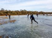 People skating on the frozen Welches Meadow today (Saturday February 13).