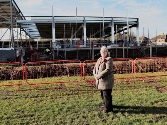 Cllr Judy Falp at the construction site at Acre Close, February 2021.