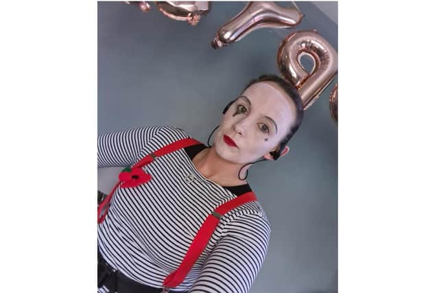 Natalie Faulkner wears her mime costume as part of her Miles for Mind scheme last month - raising money and awareness for the charity Mind.
