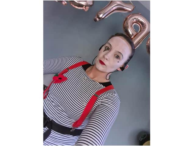 Natalie Faulkner wears her mime costume as part of her Miles for Mind scheme last month - raising money and awareness for the charity Mind.