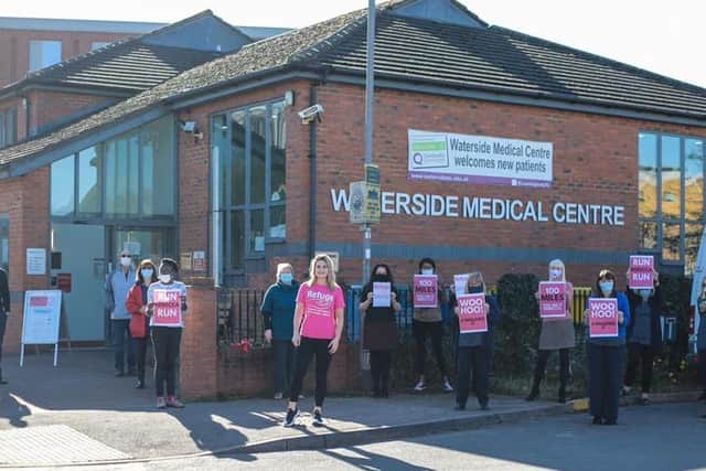 Rebecca Severs, manager of the Waterside Medical Centre in Leamington, ran 100 miles over the month of February to raise money for the charity Refuge. She is pictured with Waterside staff, many of whom donated to the cause.