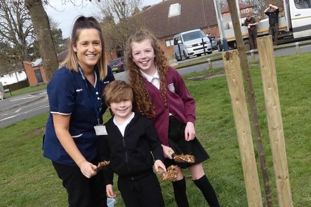 Key workers planting the trees included nurses, police officers, care workers, Henry VIII Charity, St Edith’s House, The Gap Community Centre, who were joined by pupils and adults from Emscote Infant School and All Saints’ C of E Junior School and Bishop David Evans. Photo supplied