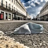 A facemask on the road of the Parade in Leamington town centre.
