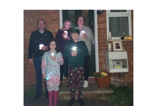 Many people held doorstep vigils. Liz Salisbury sent in this photo of the family remembering her dad, who sadly died on December 23, 2020.