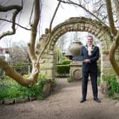 The Mayor of Warwick holding one of the special paving stones. Photo by Gill Fletcher