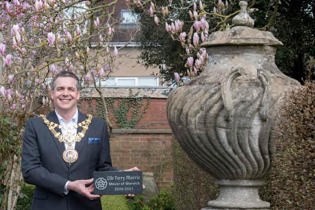 The Mayor of Warwick holding one of the special paving stones. Photo by Gill Fletcher