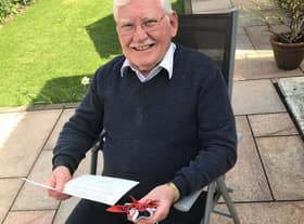Alistair Macfarlane with his Maundy Gift and letter from Her Majesty The Queen.