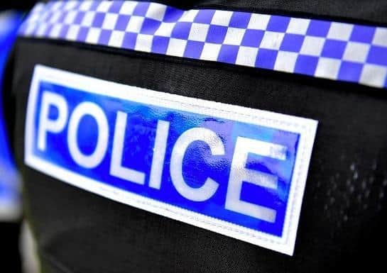 A teenager has been arrested after a Southam woman in her 70s was conned out of £10,500 by a fraudster claiming to be from the police.
