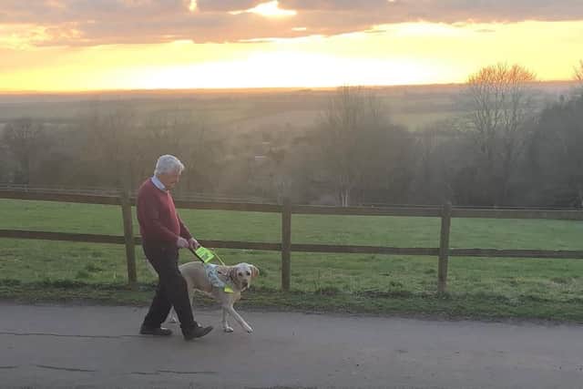 David Adams on one of his many walks up Marton Hill with his dog Jimbo.