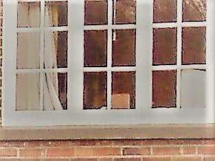 The window of the bedroom at Dial House Farm in Kenilworth where Sarah Dormer was murdered on Sunday August 29 1819. Can you see someone, or something, in the room?