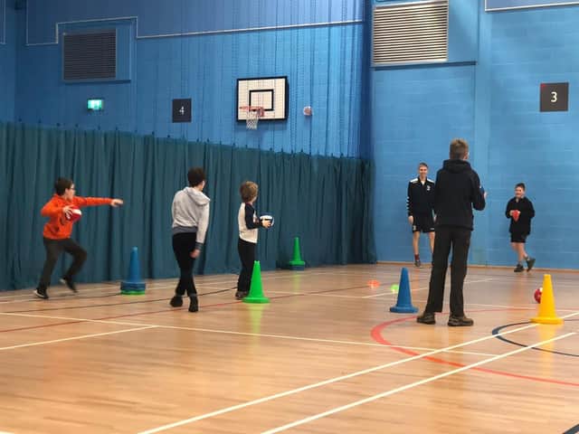 Mark holding a dodgeball session for under-11s.