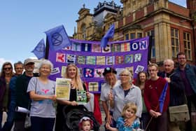 Members of the Extinction Rebellion Warwick District branch outside Leamington town hall.