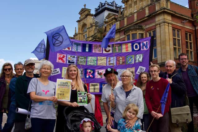 Members of the Extinction Rebellion Warwick District branch outside Leamington town hall.