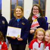 Olivia with her mother, past President of Warwick Lions Pauline Fanti and members of the St Marks Rainbow Guides. Photo supplied