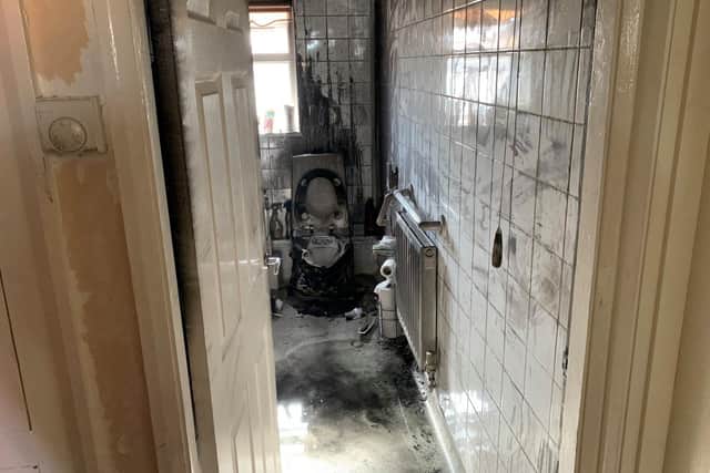 The damage in the bathroom at the property in Warwick. Photo by Kenilworth Fire Station