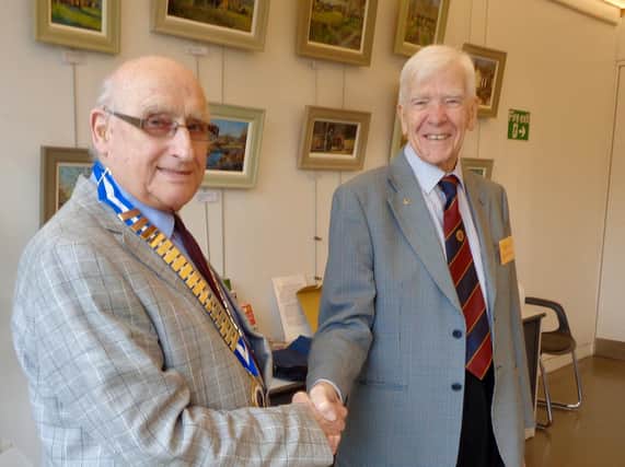 Out going President Bill Davidson (right) handed over his chain of office to Michael North who has taken over the reigns for the next twelve months. Photo submitted