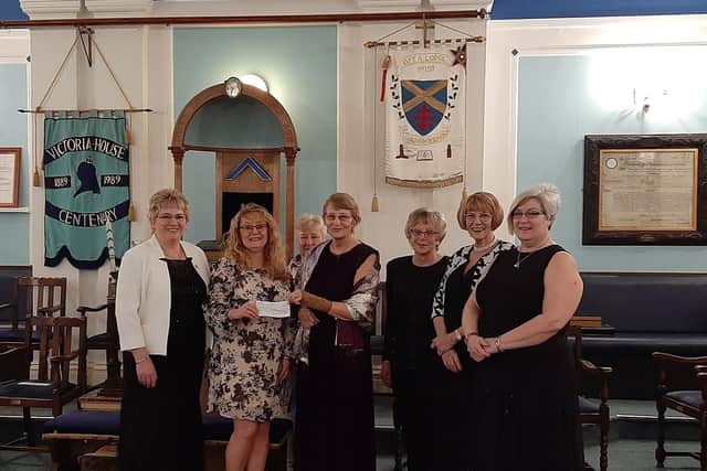 Rachael Stevens, Safelines development office with the ladies of The Order of Women  Freemansons Lodge 159. Photo supplied.
