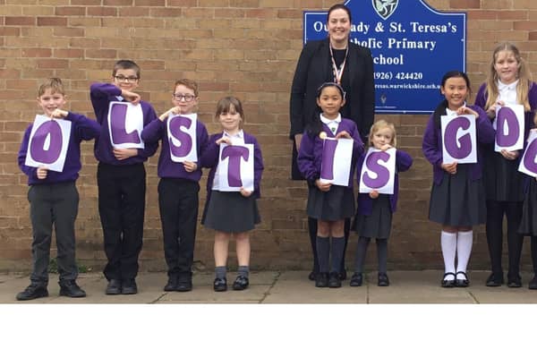 Our Lady and St Teresa's pupils celebrate the primary school's 'good' Ofsted report with headteacher Suzie Wilson
