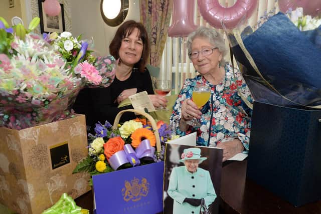 Pat Carpenter celebrates her 100th birthday with grandaughter Marie Tansley at Hazeland Court in Lutterworth.
PICTURE: ANDREW CARPENTER